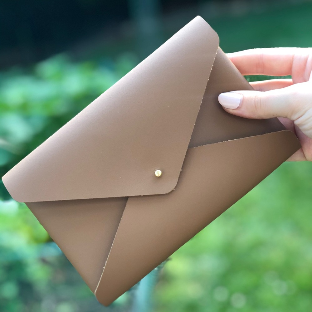 Leather pouch purse handmade by Laura